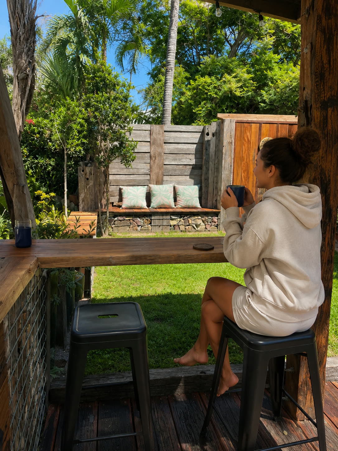Guest enjoying coffee at the outdoor bar